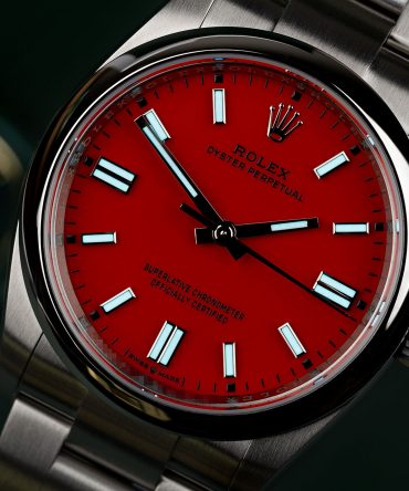 Alternative view of Rolex Oyster Perpetual 126000-0007 - 36mm - Red Dial - Oyster Stainless Steel